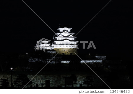 Himeji Castle, a World Heritage Site and National Treasure, illuminated on a winter night Himeji Castle, a World Heritage Site and National Treasure, illuminated on a winter night 134546423