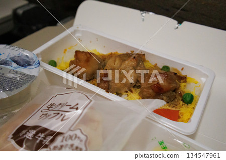 Enjoying the in-flight meal after takeoff is the highlight of the journey Enjoying the in-flight meal after takeoff is the highlight of the journey 134547961