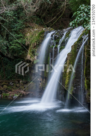 A waterfall that falls from three streams 134550700