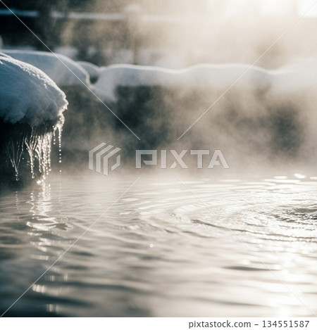 Hot spring with rising steam 134551587