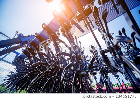 Modern agricultural machinery and equipment. Industrial details. Modern agricultural machinery and equipment. Industrial details. 134551773