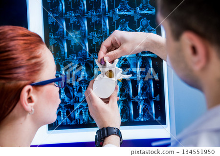 Doctors team having medical council in hospital. Discussing medical issues. Doctors team having medical council in hospital. Discussing medical issues. 134551950