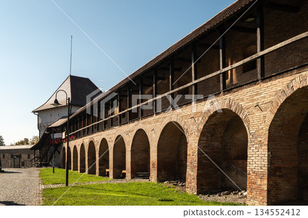 Historic Transylvanian Fortress Targu Mures Defensive Walls and Arches Under Clear Sky Historic Transylvanian Fortress Targu Mures Defensive Walls and Arches Under Clear Sky 134552412