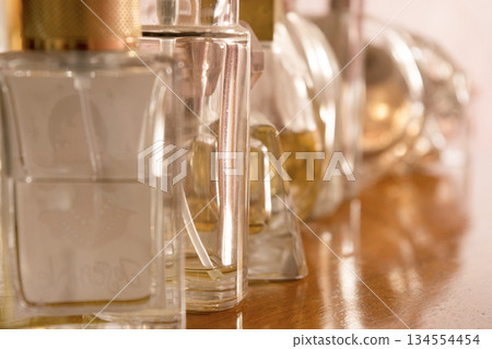 row of perfume bottles row of perfume bottles 134554454