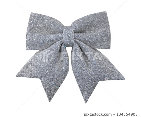 Silver shiny glitter bow. Christmas or holiday, isolated on white background. 134554905