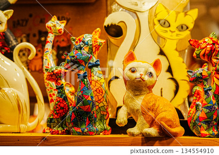 Decorative Cat Statues in Shop Window 134554910