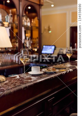 Elegant Drink Display, Chic Beverage Setting Ambiance, Sophisticated Scene With Wine And Cozy Decor 134556690