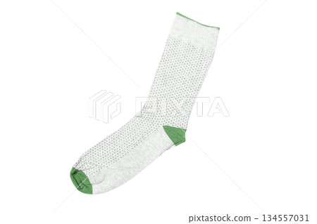 One sock with different lines isolated on white background. Colorful sock son white background. Colored socks on the leg isolated on white background One sock with different lines isolated on white background. Colorful sock son white background. Colored socks on the leg isolated on white background 134557031