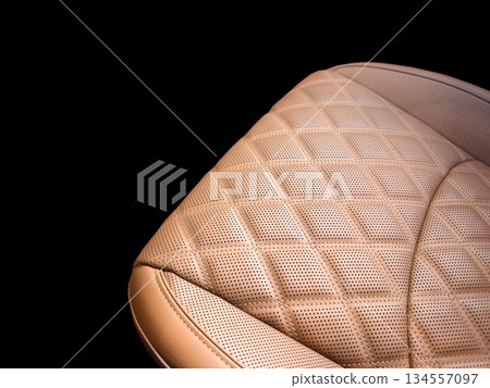 Modern luxury car brown leather interior. Part of orange leather car seat details with white stitching. Interior of prestige car. Perforated leather seats isolated. Perforated leather. Modern luxury car brown leather interior. Part of orange leather car seat details with white stitching. Interior of prestige car. Perforated leather seats isolated. Perforated leather. 134557097