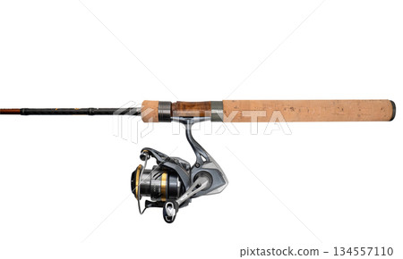 Fishing rod spinning with the line close-up. Fishing rod and reel isolated on white background. Fishing rod rings. Tackle. Fishing spinning reel. 134557110