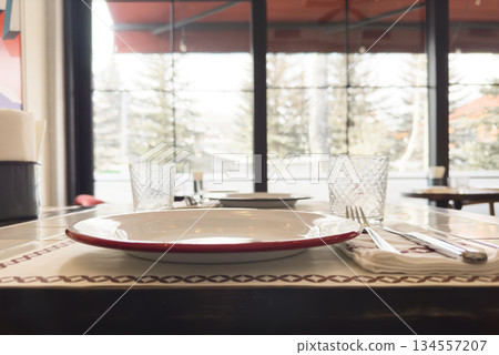Served dinner table in a restaurant. Restaurant interior Served dinner table in a restaurant. Restaurant interior 134557207