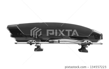 Carrier car roof box isolated. Black plastic car rooftop cargo box or roof carrier for traveling. Removable storage container mounted on car roof rack. 134557223