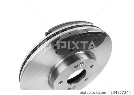 Brake discs and brake pads isolated on white background. Auto parts. Brake disc rotor isolated on white. Braking disk. Car part. Car detailing. Spare parts. Brake discs and brake pads isolated on white background. Auto parts. Brake disc rotor isolated on white. Braking disk. Car part. Car detailing. Spare parts. 134557244