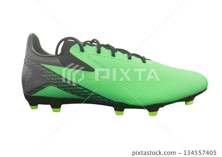 Green modern soccer boots isolated on white background. Leather football boot isolated. Professional athletics training shoes. Sports shoes. Green modern soccer boots isolated on white background. Leather football boot isolated. Professional athletics training shoes. Sports shoes. 134557405