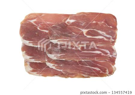 Jamon serrano. A Spanish ham isolated on white background. Traditional spanish jamon sliced. Dry cured meat ham. Hamon iberico Jamon serrano. A Spanish ham isolated on white background. Traditional spanish jamon sliced. Dry cured meat ham. Hamon iberico 134557419