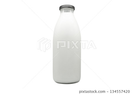 Glass bottle of fresh milk mockup with black colored cap enclosure isolated on white background. Unmarked bottles filled with milk. 134557420