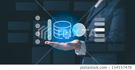 Business professional presenting glowing database icon with digital process elements, symbolizing data flow, information management, system integration, cloud technology, modern IT workflow solutions Business professional presenting glowing database icon with digital process elements, symbolizing data flow, information management, system integration, cloud technology, modern IT workflow solutions 134557476