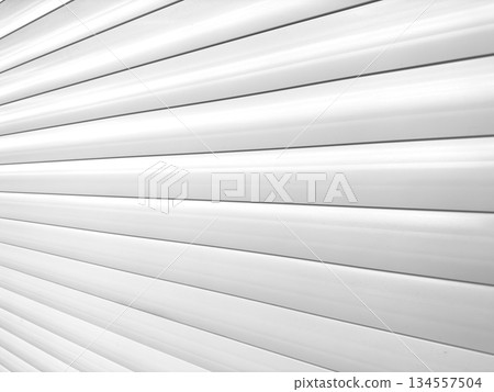 Roller shutter gate. Metal roller garage door as background. Automatic electric roll-up garage gate. Garage with white rolling gates. 134557504