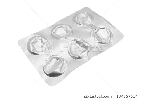 Empty pills of blister pack isolated on white background. Empty silver blister. Used blister pill. Empty blister pack from drugs. Empty pills of blister pack isolated on white background. Empty silver blister. Used blister pill. Empty blister pack from drugs. 134557514