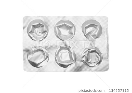 Empty pills of blister pack isolated on white background. Empty silver blister. Used blister pill. Empty blister pack from drugs. 134557515