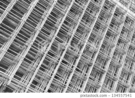 Steel bar or steel reinforcement bar. Construction armature. Reinforcements iron bars in row. The steel rebars. Steel rods bars texture background. 134557541