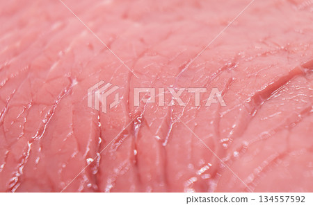 Beef red meat texture background. Fresh beef piece macro shot. Meat texture. Macro shot raw fillet of beef steak. 134557592