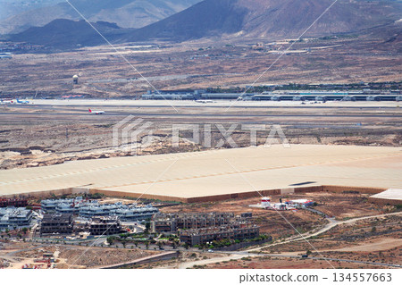 Greenhouses on coast near Tenerife airport, sunny summer day, Canary Islands, Spain Greenhouses on coast near Tenerife airport, sunny summer day, Canary Islands, Spain 134557663