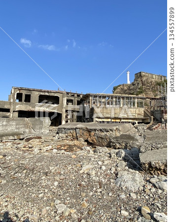 The ruins of collapsed buildings and industrial heritage sites remain on Gunkanjima (Hashima Island) The ruins of collapsed buildings and industrial heritage sites remain on Gunkanjima (Hashima Island) 134557899