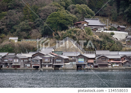 Traditional wooden fishermen Funaya boathouses in Ine, north Kyoto prefecture on the Sea of Japan 134558033