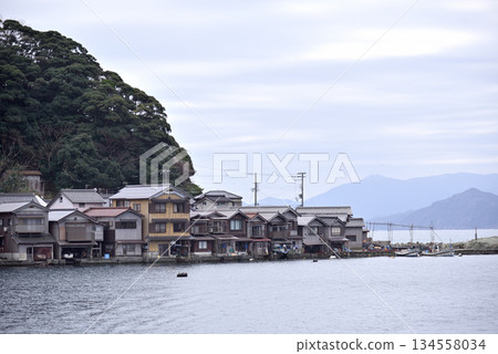Traditional wooden fishermen Funaya boathouses in Ine, north Kyoto prefecture on the Sea of Japan 134558034