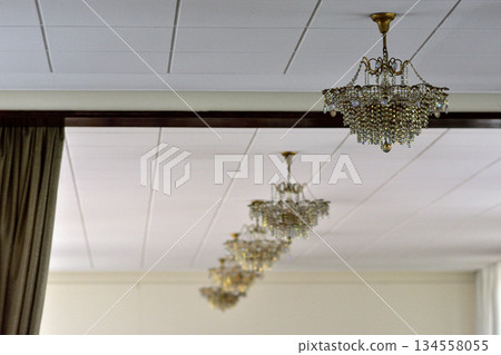 Elegant Chandeliers in Formal Setting Elegant Chandeliers in Formal Setting 134558055