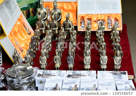Miniature terracotta warrior figurines displayed in a souvenir shop in Xian, China 134558057