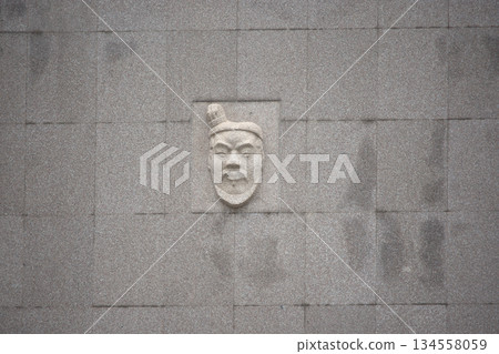 Face of Terracotta warrior on the facade of Terracotta Army museum in Xian, China 134558059