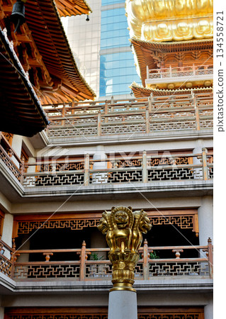 Historic Buddhist temple complex of Jingan Temple on the West Nanjing Road in downtown Shanghai, China Historic Buddhist temple complex of Jingan Temple on the West Nanjing Road in downtown Shanghai, China 134558721