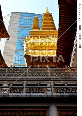 Historic Buddhist temple complex of Jingan Temple on the West Nanjing Road in downtown Shanghai, China 134558723