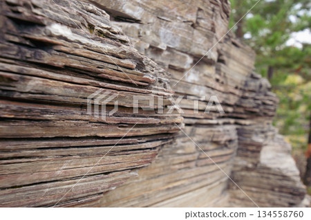 The layered rock formations and distinctive geological landscape of the Marble Valley 134558760