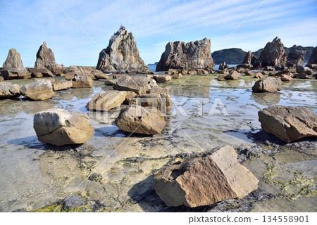 Hashigui Rocks natural stone formations in Kushimoto Town in Kii Peninsula in Wakayama, Japan 134558901