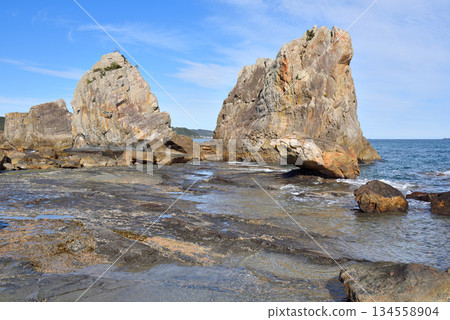 Hashigui Rocks natural stone formations in Kushimoto Town in Kii Peninsula in Wakayama, Japan 134558904