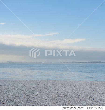 Marble beach and Kansai International Airport in the background in Tajiri-cho in Izumisano, Osaka Prefecture of Japan Marble beach and Kansai International Airport in the background in Tajiri-cho in Izumisano, Osaka Prefecture of Japan 134559158