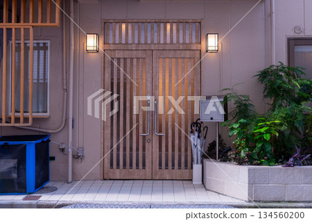 sidewalk by street wall and door sidewalk by street wall and door 134560200