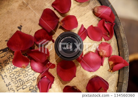 Camera lens and rose petals Camera lens and rose petals 134560360