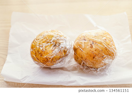 Wrapped potatoes 134561151