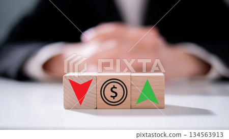 Income debt interest percent inflation with increase and decrease icon on wooden block finance business economy investment concept 134563913