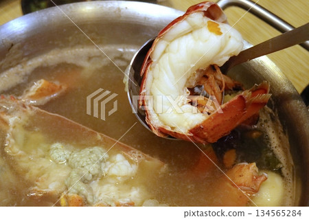Lobster tail hot pot with spoon 134565284