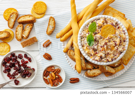 cranberry apricot cheese spread in a bowl 134566007