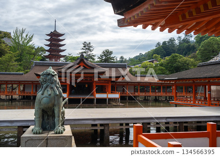 View of Itsukushima Shrine and pagoda on Miyajima island, Japan View of Itsukushima Shrine and pagoda on Miyajima island, Japan 134566395