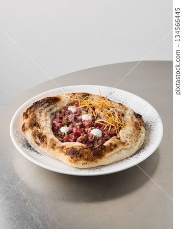 Mouthwatering pizza featuring rich meat sauce and melted cheese Mouthwatering pizza featuring rich meat sauce and melted cheese 134566445