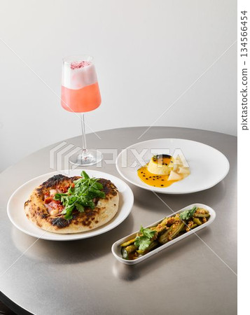 Lively bistro featuring diverse selection of appetizers and drinks Lively bistro featuring diverse selection of appetizers and drinks 134566454