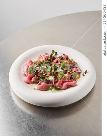 plant forward beet gnocchi with microgreens, menu highlight 134566458