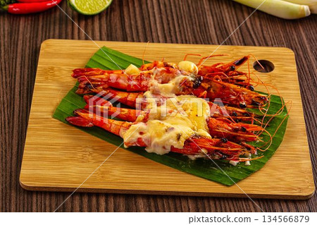 Baked tiger prawns with cheese Baked tiger prawns with cheese 134566879